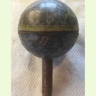 Miniature Globe with wooden handle.