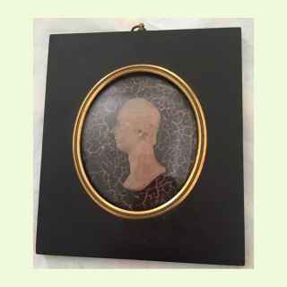 A miniature profile to the left. wax relief signed below the bust 1806 by Catherine Andras (British, 1785?1860) ,