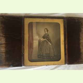 Large albumen hand coloured photograph of a young lady.